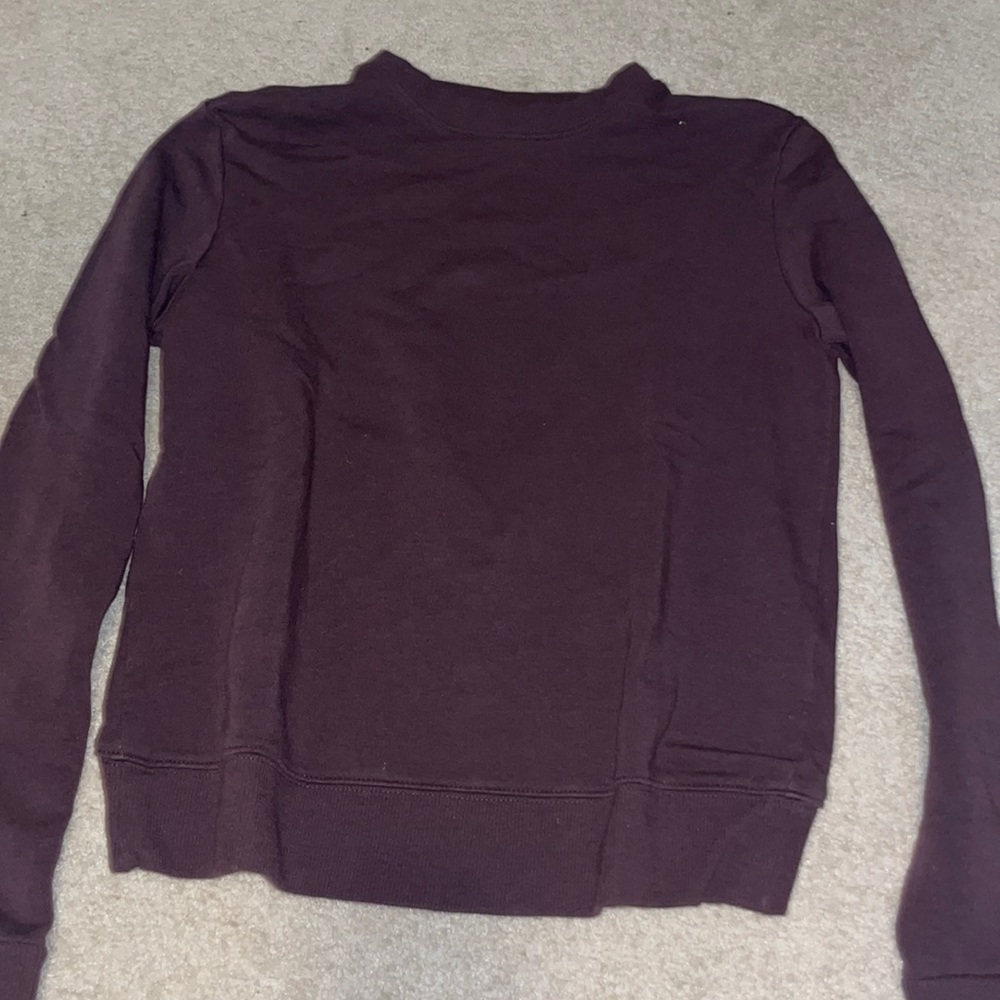 Woman’s wine colored crew neck